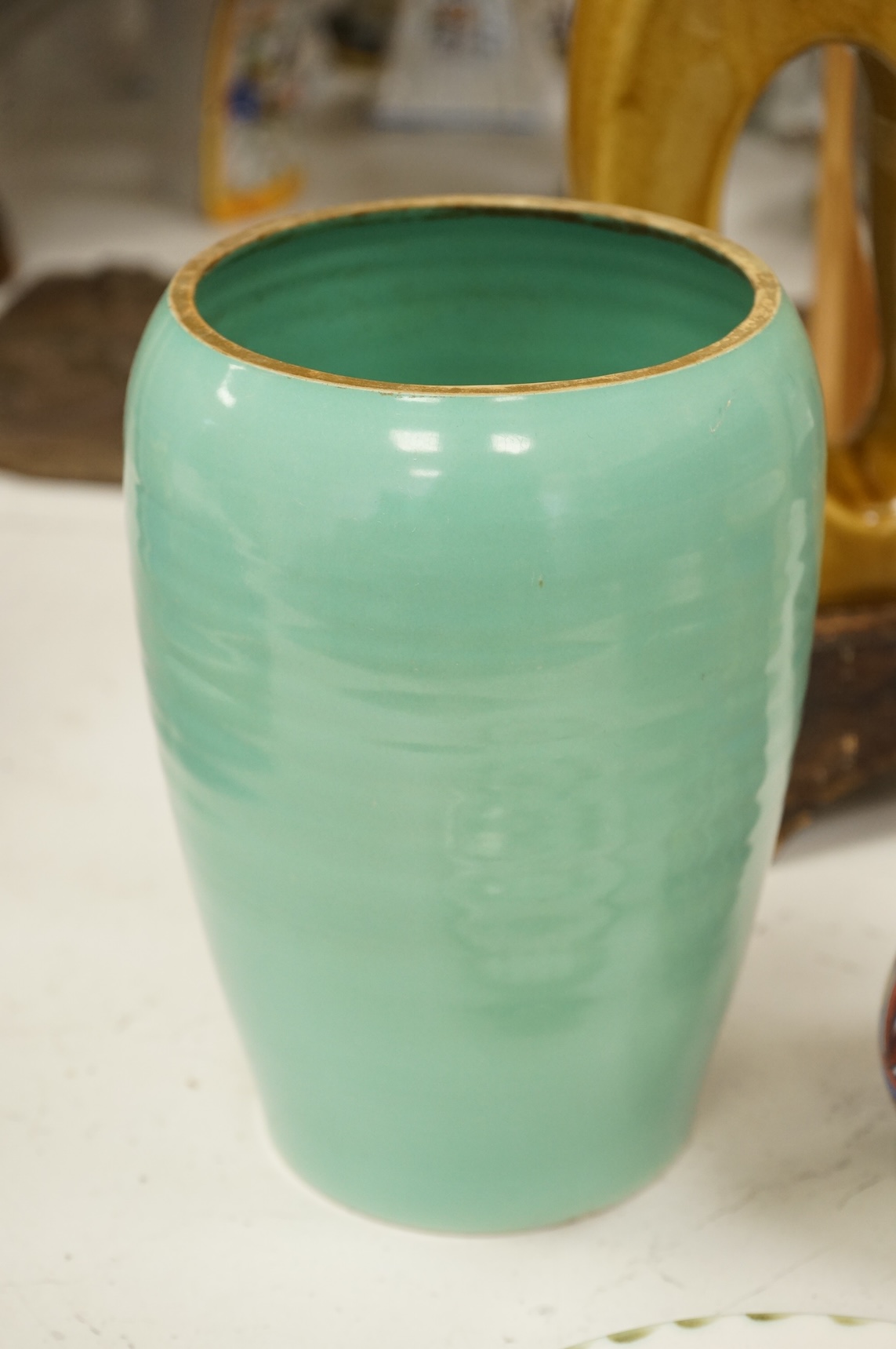 A collection of ceramics to include a Poole turquoise vase, modernist elephant and Santo Stefano di Camastra vase, largest 37cm high